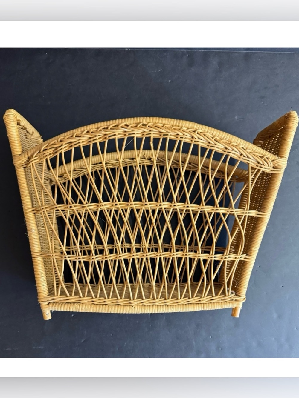 Vintage Handmade tan Bohemian delicate wicker magazine holder.